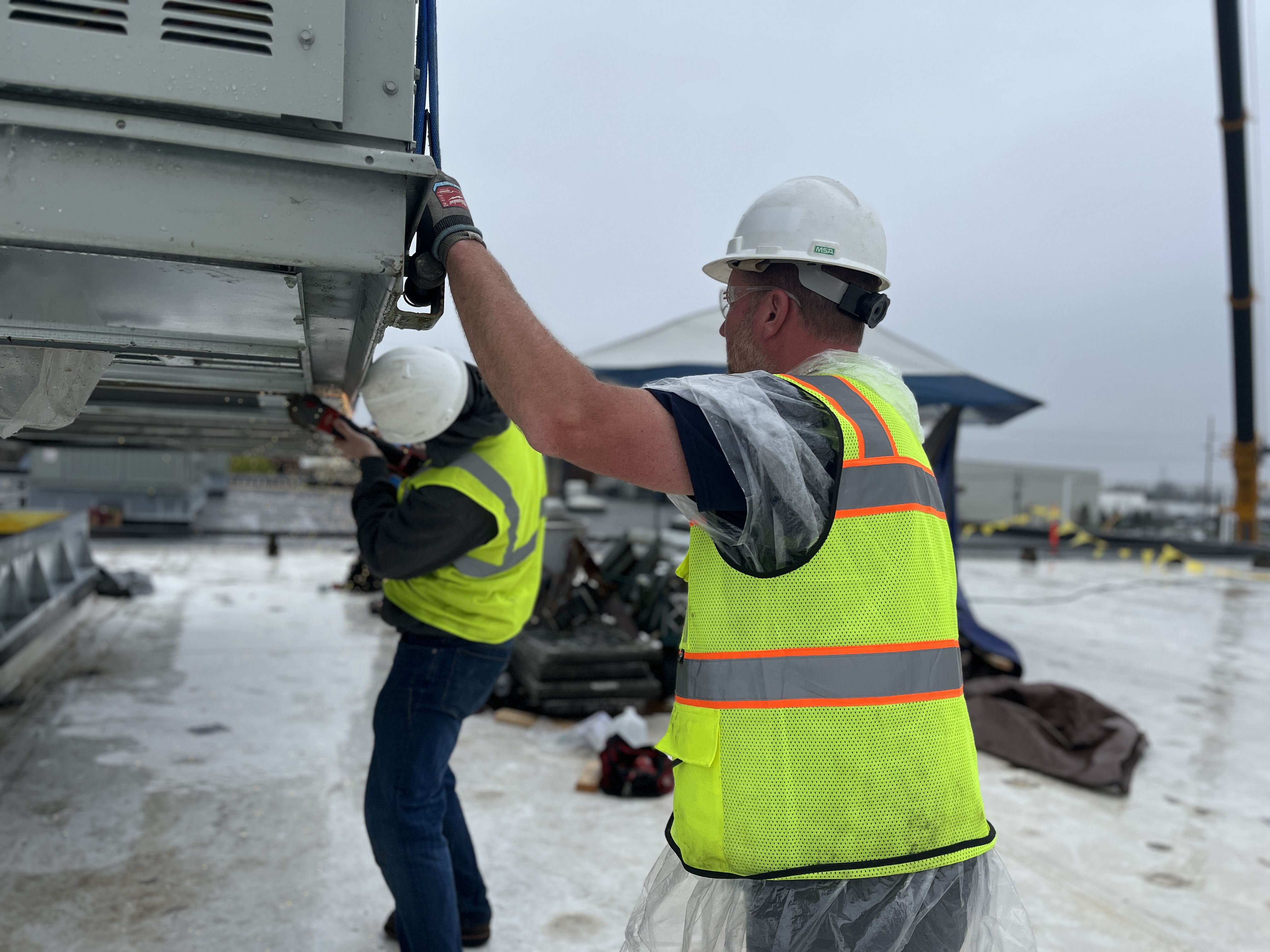 Crossroads Mechanical team at Holland, MI metal stamping plant rooftop unit replacement project