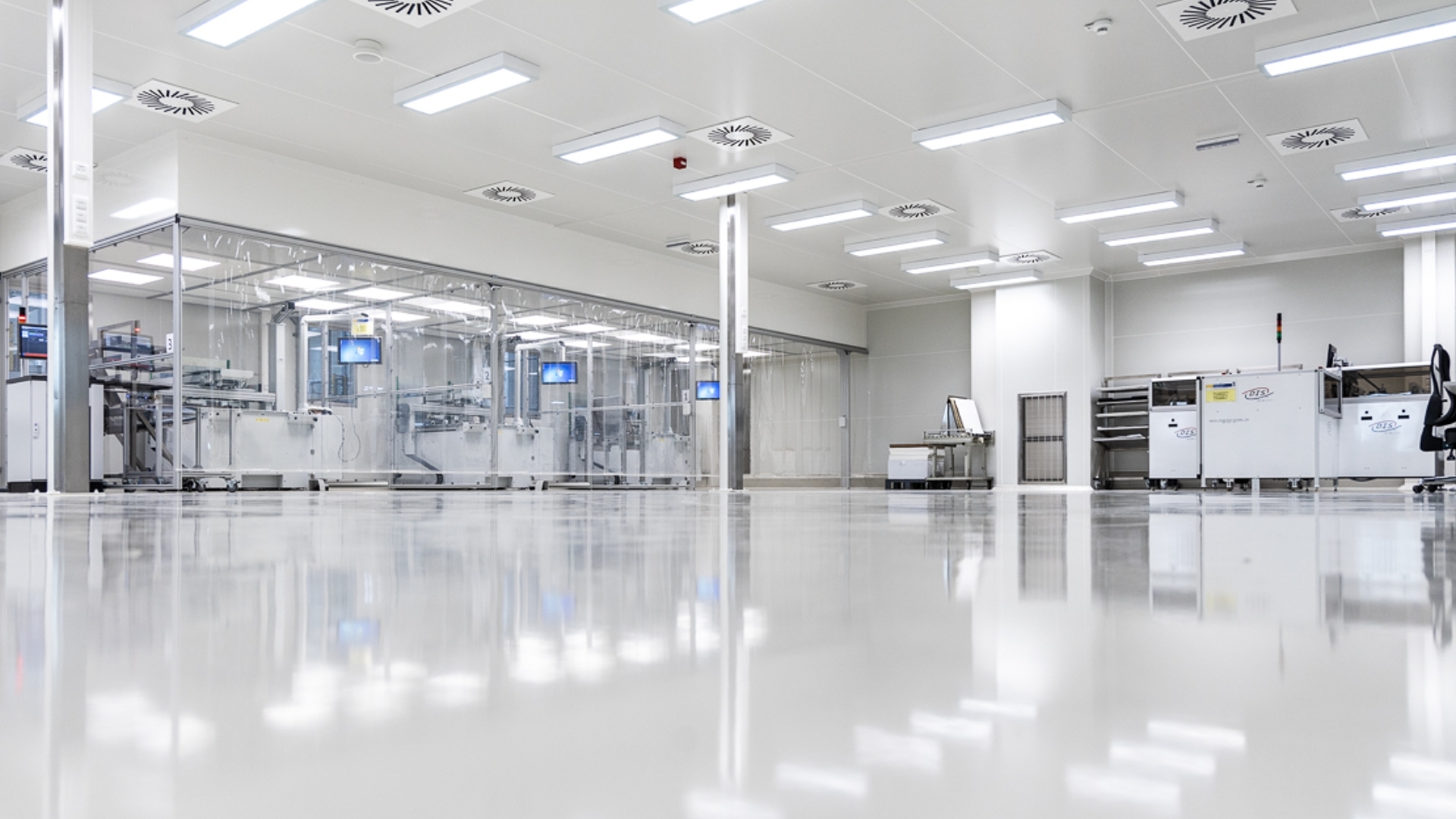 Technician inspecting HVAC unit in critical environment