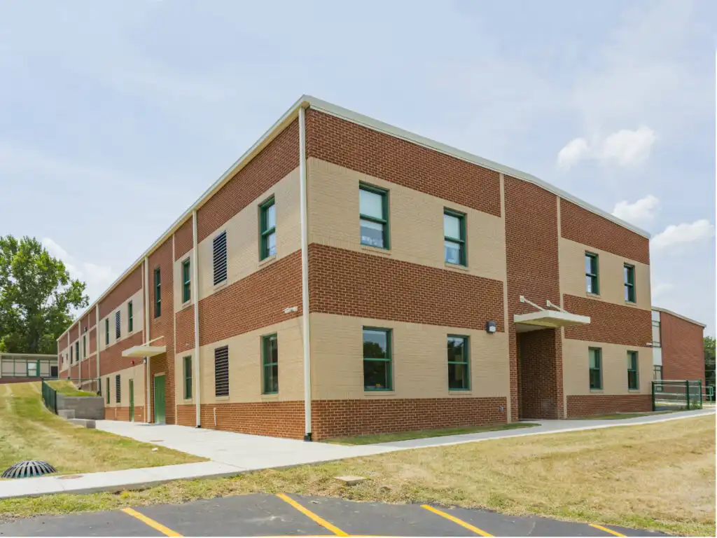 Technician working on HVAC control panel