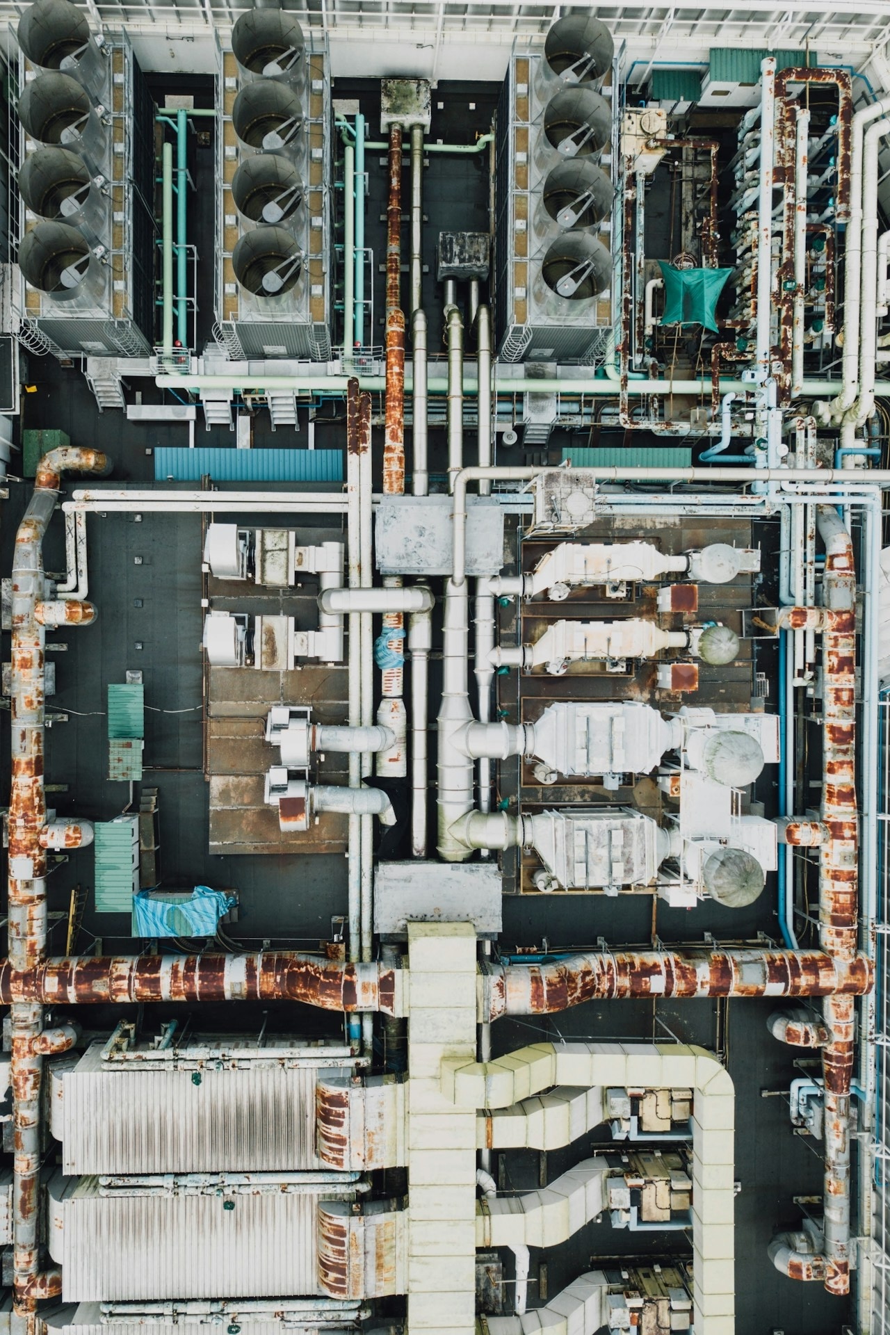 Industrial HVAC technician inspecting process chiller system