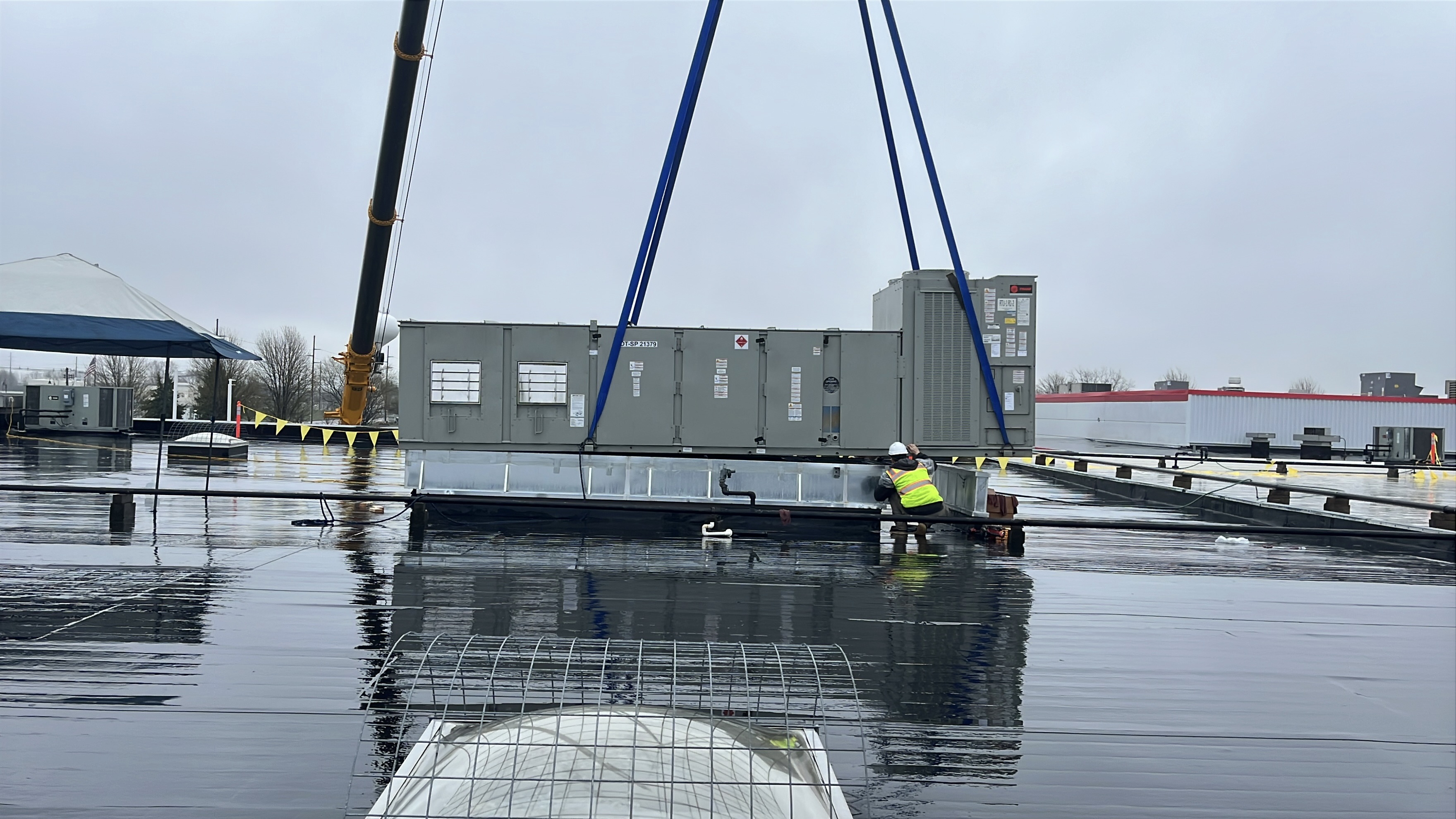 New rooftop HVAC unit being set into position at Holland, MI metal stamping plant